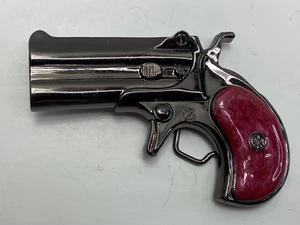 Pistola de mano Derringer vintage con hebilla de cinturón años 70 - Imagen 1 de 9