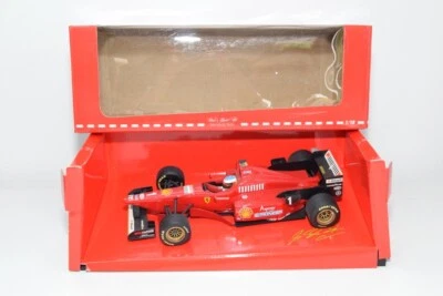 B64 1:18 MINICHAMPS 510 951821 FERRARI F310/2 SCHUMACHER F1 AUTO DA CORSA NUO... - Immagine 1 di 4