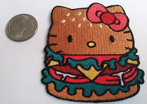 Nuevo parche en hierro bordado con temática de hamburguesa/hamburguesa con queso Hello Kitty - Imagen 1 de 1