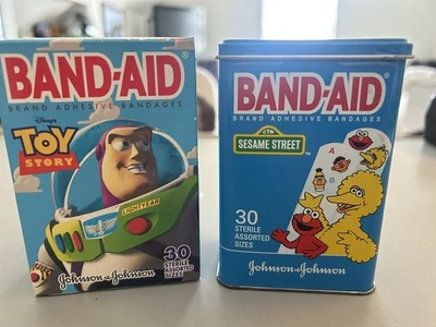 Vintage Johnson Johnson Kids Sesame Street (Metal) and Toy Story Band Aid Boxes - Image 1 of 4