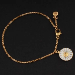 Pulsera de ley GEORG JENSEN con esmalte blanco. Margarita dorada. Anton Michelsen. - Imagen 1 de 5