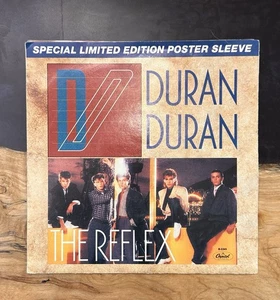 DURAN DURAN - THE REFLEX - CAPITOL RECORDS 7" SINGLE IN POSTER SLEEVE - Picture 1 of 5