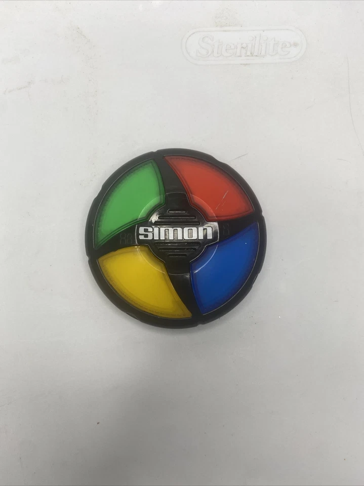 Mini Handheld Simon Says Pocket Electronic Game Tested & Works Kids Toy  - Image 1 of 1