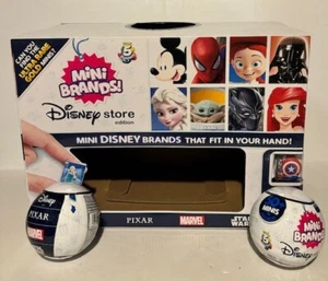 Disney store edition mini Brands Zuru 2 mystery balls and display case NEW! - Picture 1 of 2