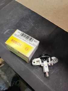 REGOLATORE ALTERNATORE BOSCH 1197311242 PER MERCEDES W124 CLASSE C E G V VITO - Foto 1 di 5