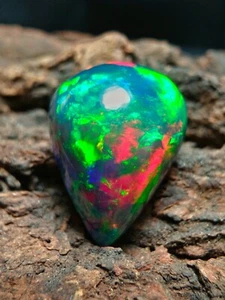 Natürlicher äthiopischer Multi Feueropal 13,70 Ct Birnenschliff echter Schwarzopal Cabochon - Bild 1 von 10