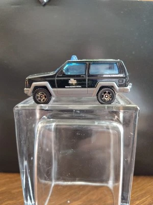 Matchbox Jeep Cherokee Texas Highway Patrol State Trooper Black 1:64 - Image 1 of 4