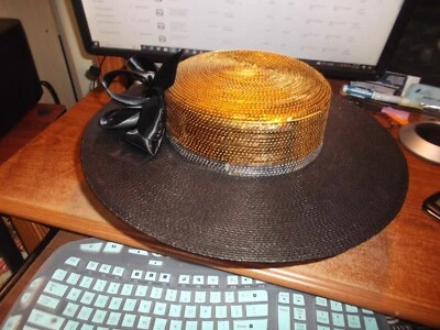 Sombrero negro con lentejuelas doradas. Llanta ancha Foto 1 de 4