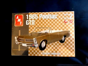 Model Kit 1965 Pontiac GTO 3n1 Kit AMT 1:25 - Picture 1 of 3