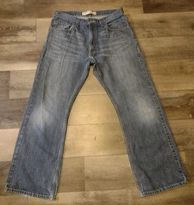 Levi's 557 Relaxed Boot Cut Jeans Mens 32 X 30 Blue Medium Wash Cotton - Picture 1 of 13