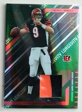 2004 LEAF ROOKIES & STARS LONGEVITY CARSON PALMER RUBY RED JERSEY RELIC /99