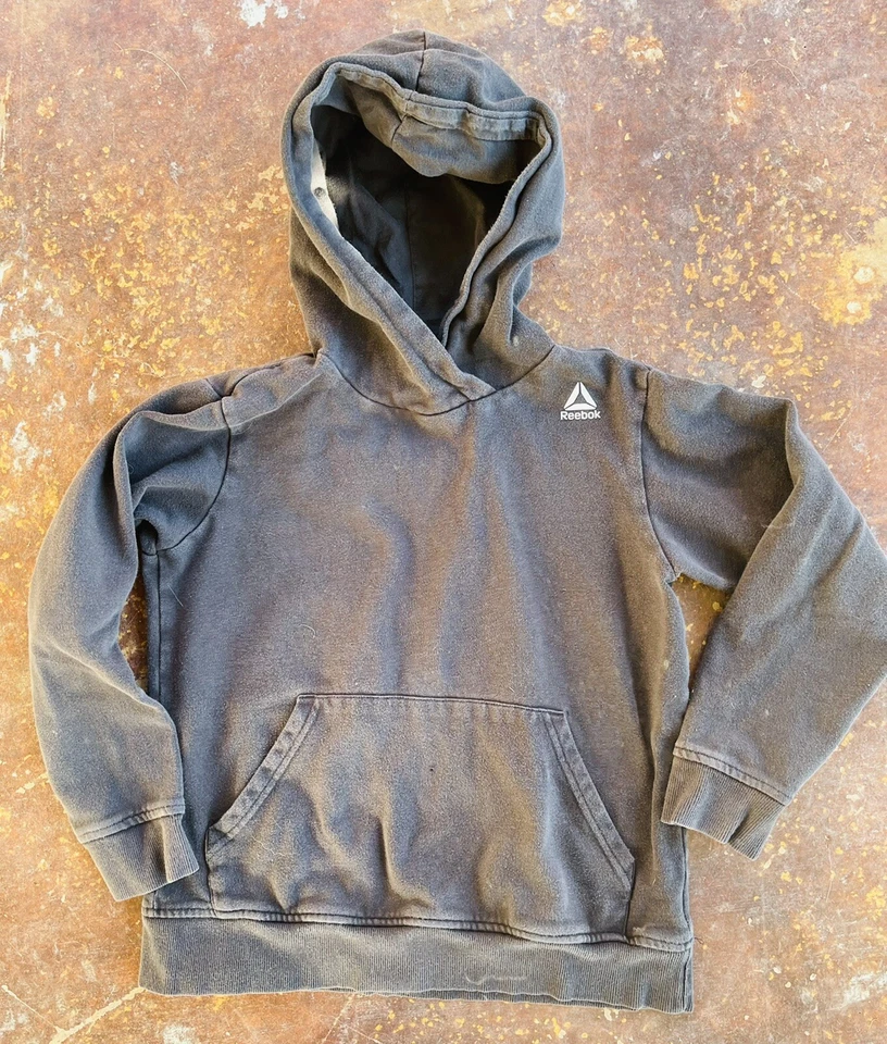 Sudadera con capucha Reebok Youth mediana de algodón - niños 10-12 años - usada Foto 1 de 3