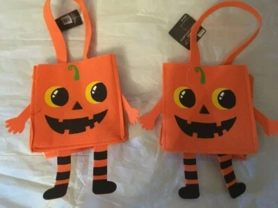 Happy Halloween (2) 橙色南瓜面部护理毛毡派对糖果袋。 7 x 7 英寸  — 第 1/2 张图片