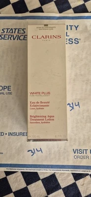 Clarins White Plus Brightening Aqua Treatment Loción, 200 ml / 6,7 fl oz Nuevo en caja Foto 1 de 4