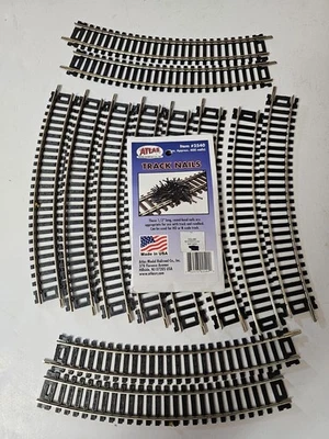 (12) Atlas HO 15" Radius Curve Track, Code 100, NS - Full circle, NEW, loose - Image 1 of 4