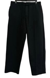 Pantalones deportivos Nike Tech polar reimaginados calce suelto dobladillo abierto negros para hombre medianos - Imagen 1 de 7