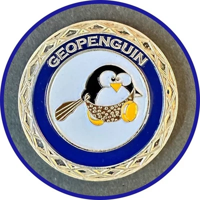 Geocoin GEOPENGUIN Return To The Earth Nickel Unactivated - Image 1 of 2