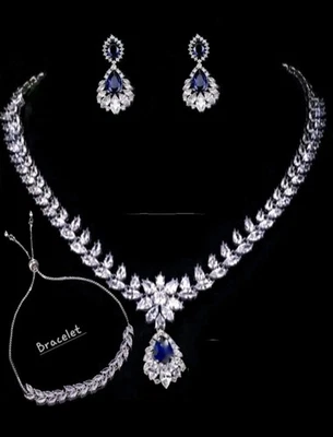 Набор свадебных украшений из 18-каратного платинового покрытия с заманчивым голубым топазом созданный в лаборатории Swarovski - Изображение 1 из 4