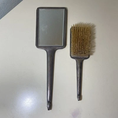 Antiguo cepillo de pelo y espejo Art Deco de plata esterlina de R. W. Wallace and Sons Foto 1 de 4