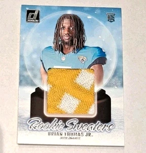 2024 Panini Donruss Rookie Sweaters Relic #BTH Brian Thomas Jr Rc Sweater - Bild 1 von 3