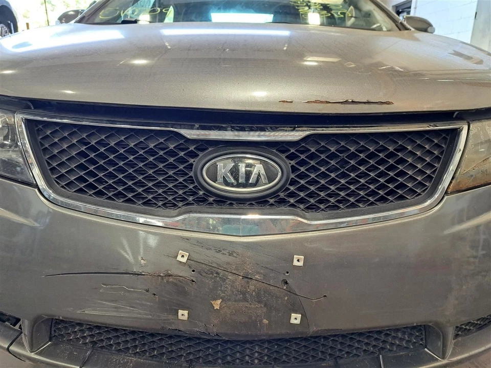 Rejilla inferior izquierda lado del conductor Forte Sku #4255254 2010 Foto 1 de 4