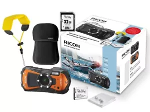 Ricoh WG-80 orange Zubehörpaket inkl: 32GB Karte / Case / Strap / Akku / Tuch - Bild 1 von 2