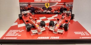 2 CAR SET 1:43 HOT WHEELS FERRARI F2005 SCHUMACHER BARRICHELLO 2005 MARLBORO - Picture 1 of 6