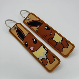 Pokémon EEVEE Jet Tag Double-Sided Embroidered Keychain ~ FREE US SHIPPNG - Picture 1 of 3