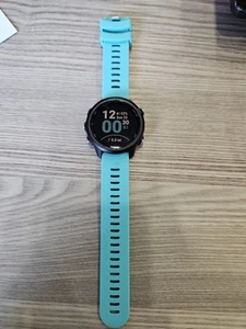 Reloj GPS Garmin Forerunner 245 estuche de plástico negro correa azul - Imagen 1 de 3