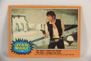 Star Wars 1977 Trading Card #157 Han Solo Covers His Friends FR-ENG OPC L018833 - Picture 1 of 2