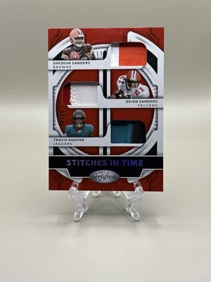 2025 Certified FOTL Stitches In Time Deion, Shedeur Sanders & Travis Hunter /35  - Image 1 of 4
