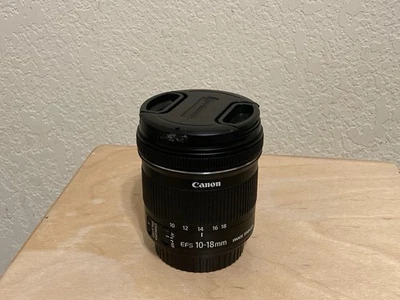 Lente zoom Canon EF-S 9519B002 10-18 mm f/4,5-5,6 IS STM - negra Foto 1 de 4