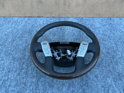 INFINITI QX80 QX56 2011-2017 OEM RUEDA DE CONDUCTOR IZQUIERDA MADERA CON MONTAJE DE INTERRUPTORES Foto 1 de 4