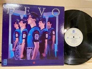 DEVO "New Traditionalist" + Giant Poster plus45rpm - 1981 - Vinyl Lp Ex+/N/M - Picture 1 of 5