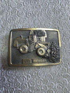 Hebilla de cinturón vintage VME Volvo Michigan maquinaria pesada minería - Imagen 1 de 2
