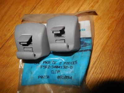 NOS 1995-2000 Ford Contour Clips de visera solar gris F5RZ-5404132-A Foto 1 de 2