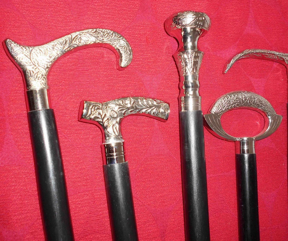 Juego de 4 bastones de madera negros con mango de latón estilo náutico vintage Foto 1 de 4