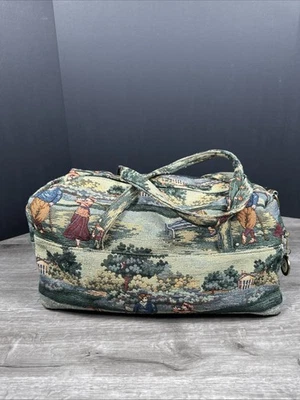 Bolsa de viaje de tapiz temática de golf Holdings de colección durante la noche fin de semana  Foto 1 de 4