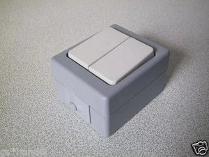 KOPP Serienschalter AP FR STANDARD grau-weiss (IP44) Aufputz Doppel 1polig - Bild 1 von 1