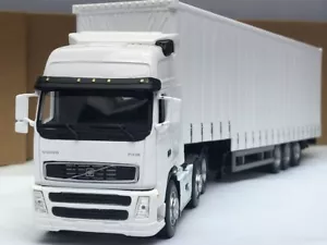 Remolque de camión camión Volvo FH12 escalonado junto a la cortina 1/50 modelo diecast Cararama - Imagen 1 de 9