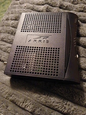 ARRIS Touchstone TM402P/110 Telephony VOIP Cable Modem with Power Cord - Image 1 of 3