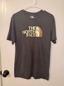 Camiseta manga corta The North Face Logo gris jaspeado dorado brillante logotipo mujer pequeña - Imagen 1 de 6