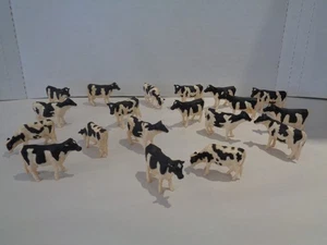 VINTAGE HERDE SCHWARZ-WEISSER HOLSTEINKÜHE. 19ER SET. HARTPLASTIK/HARZ. 1990 - Bild 1 von 7