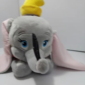Disney Store Dumbo grande peluche 17” sdraiato o volante con piuma nel baule - Foto 1 di 10