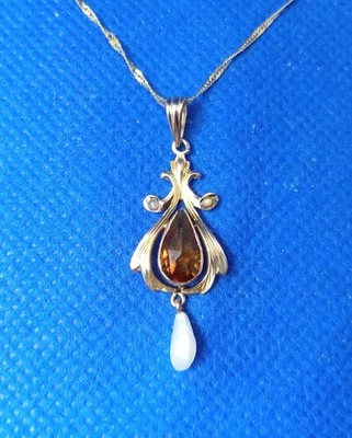 Colgante estilo Art Nouveau de perlas de oro amarillo de 10 quilates y piedra naranja y cadena de 14 quilates Foto 1 de 4