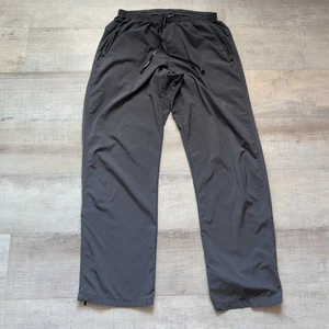 Pantaloni da corsa Nike Dri-Fit grigi taglia L pantaloni da allenamento uomo impermeabili zip alla caviglia - Foto 1 di 8
