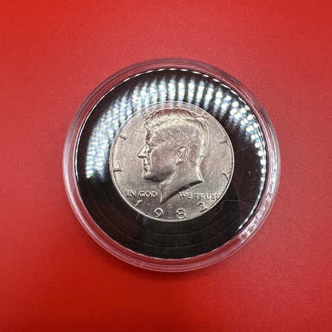 1982P Kennedy Half Dollar - No "FG" initials with strike through on obverse Cover