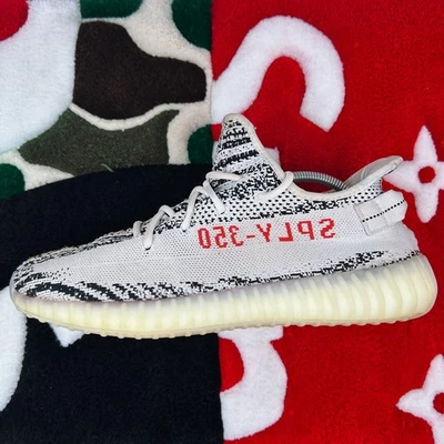 Talla 11 - Adidas Yeezy Boost 350 V2 Zebra *CAJA USADA/DAÑADA* Foto 1 de 4