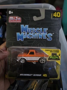 1/64 MUSCLE MACHINES MIJO EXCLUSIVES 1972 CHEVROLET C-10 PICKUP ORANGE & WHITE - Picture 1 of 1