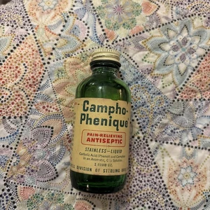 Campho-Phenique 2 oz Green Glass Bottle Tin Lid Over 1/2 Full Made USA Vintage - Picture 1 of 6